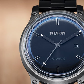 A Nixon Automatic watch.